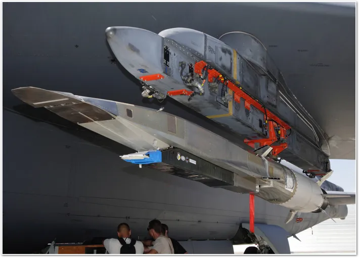 An X-51A WaveRider hypersonic flight test vehicle is uploaded to an Air Force Flight Test Center B-52 at Edwards Air Force Base on July 17, 2009