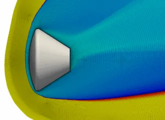 Block-adapted, shock-fitted structured grid for the Orion reentry capsule in hypersonic conditions, showing blocks precisely aligned with the shock surface and refined grid clustering near critical high-gradient regions for improved simulation accuracy.