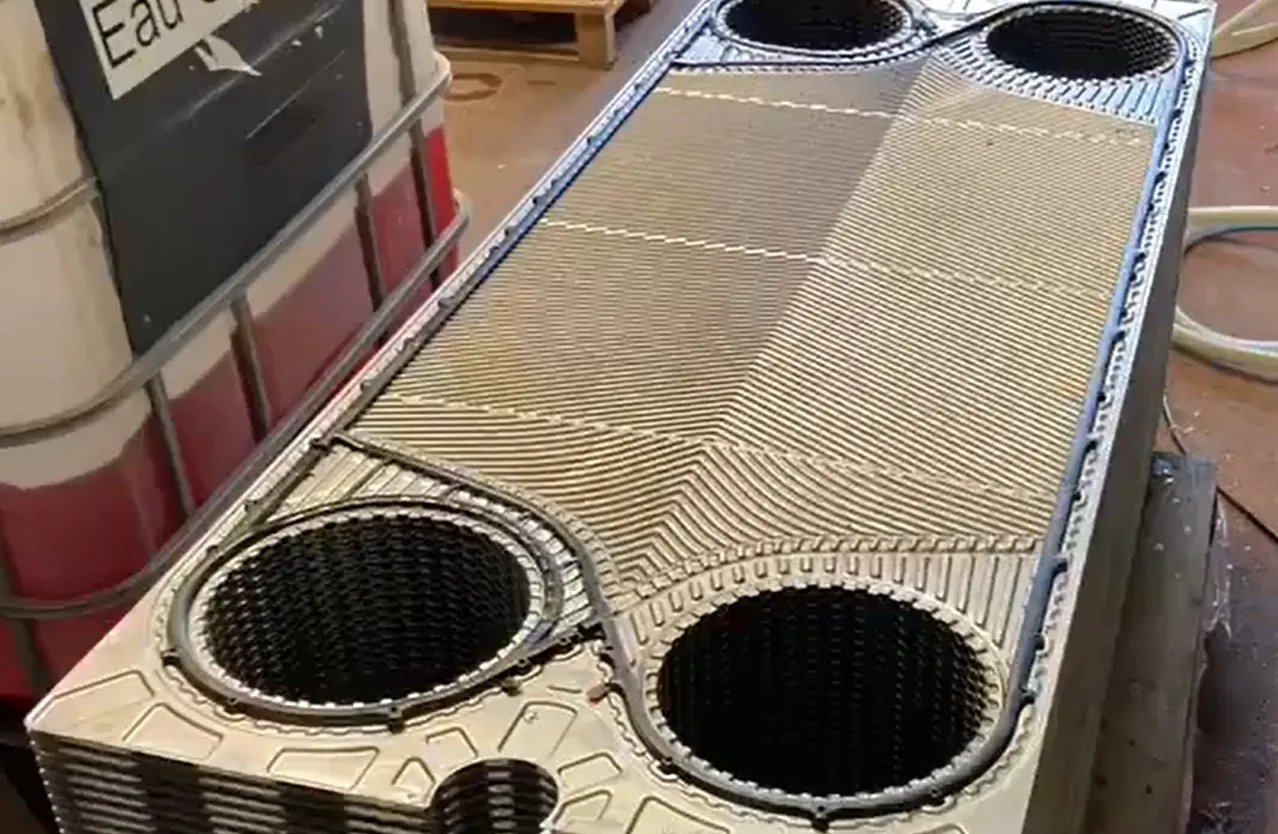 Industrial plate heat exchanger showing multiple stacked heat-transfer plates.
