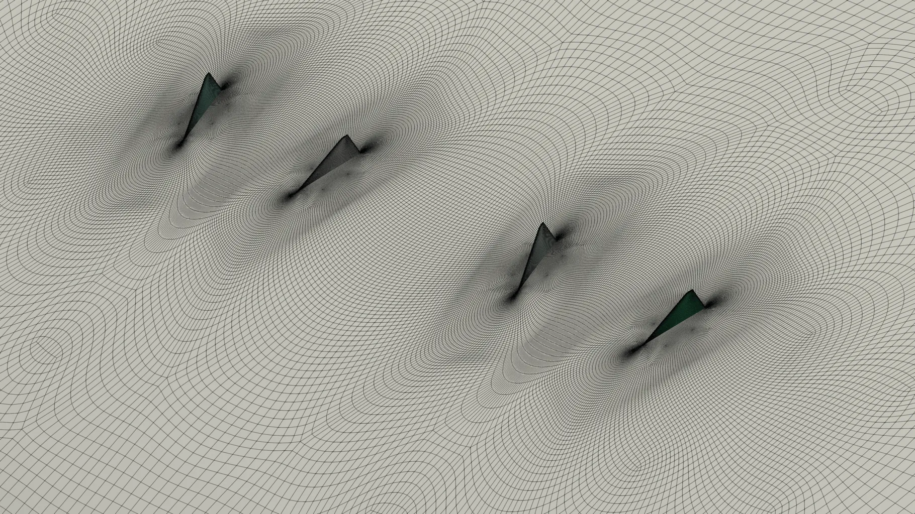 Multiple pairs of vortex generators on a wind turbine blade, where the block topology created for one VG is duplicated and translated to produce self-similar hexahedral meshes around the others, enabling fast and efficient meshing of all vortex generators.
