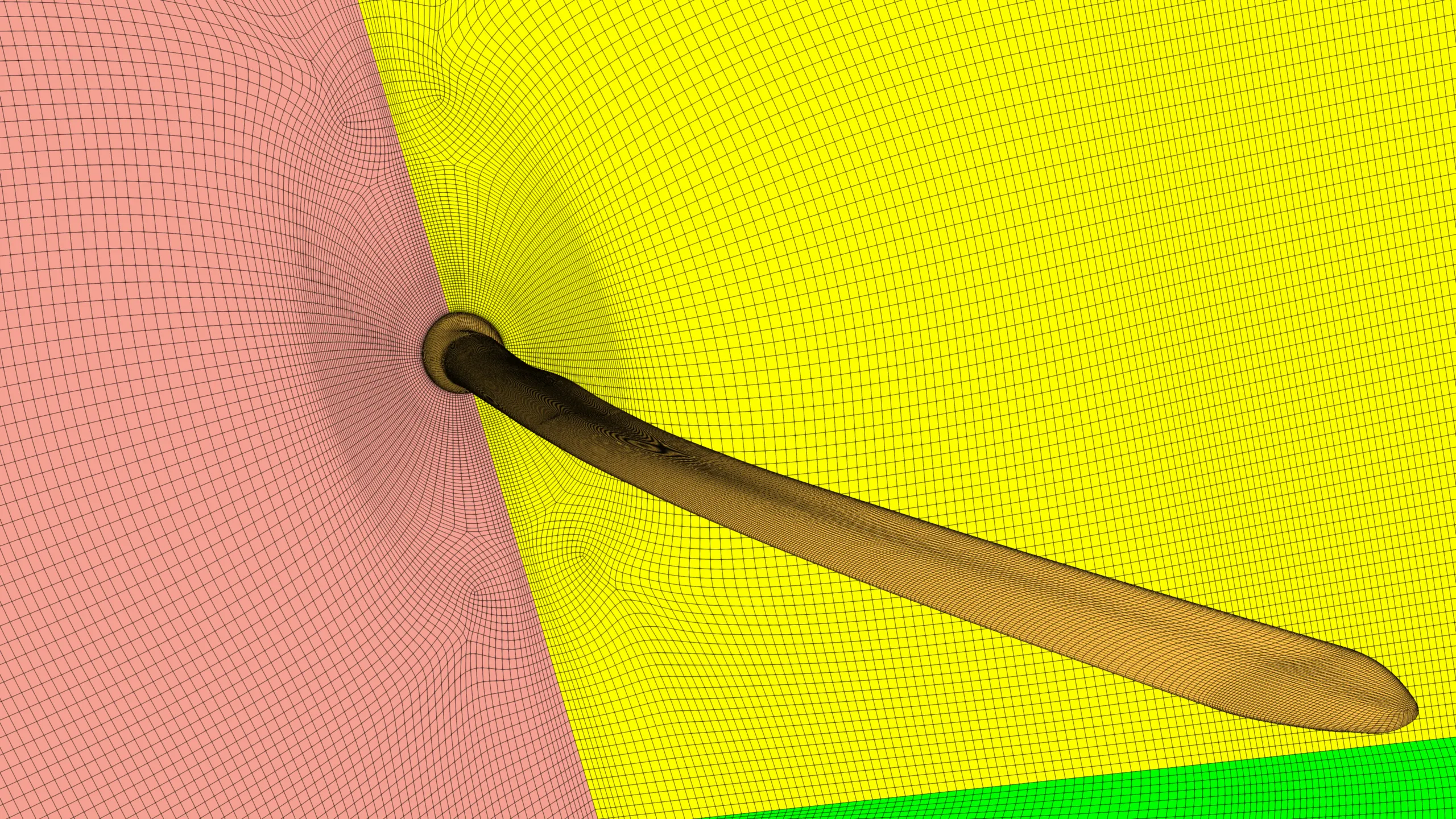 Structured multiblock mesh of a wind turbine blade showing the complete domain from root to tip, with smooth block transitions and refined grid distribution for accurate aerodynamic CFD simulation.